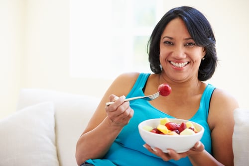Women Eating Fruit